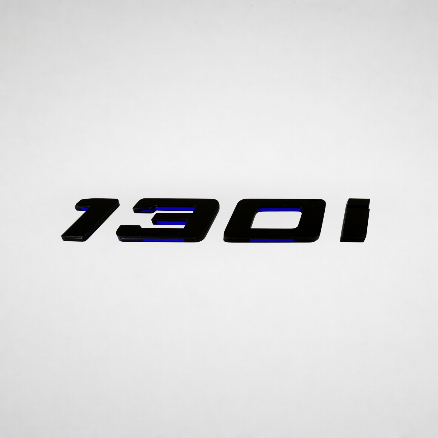 130i BMW Badge