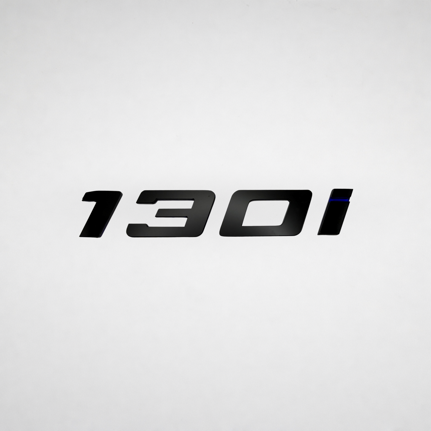 130i BMW Badge