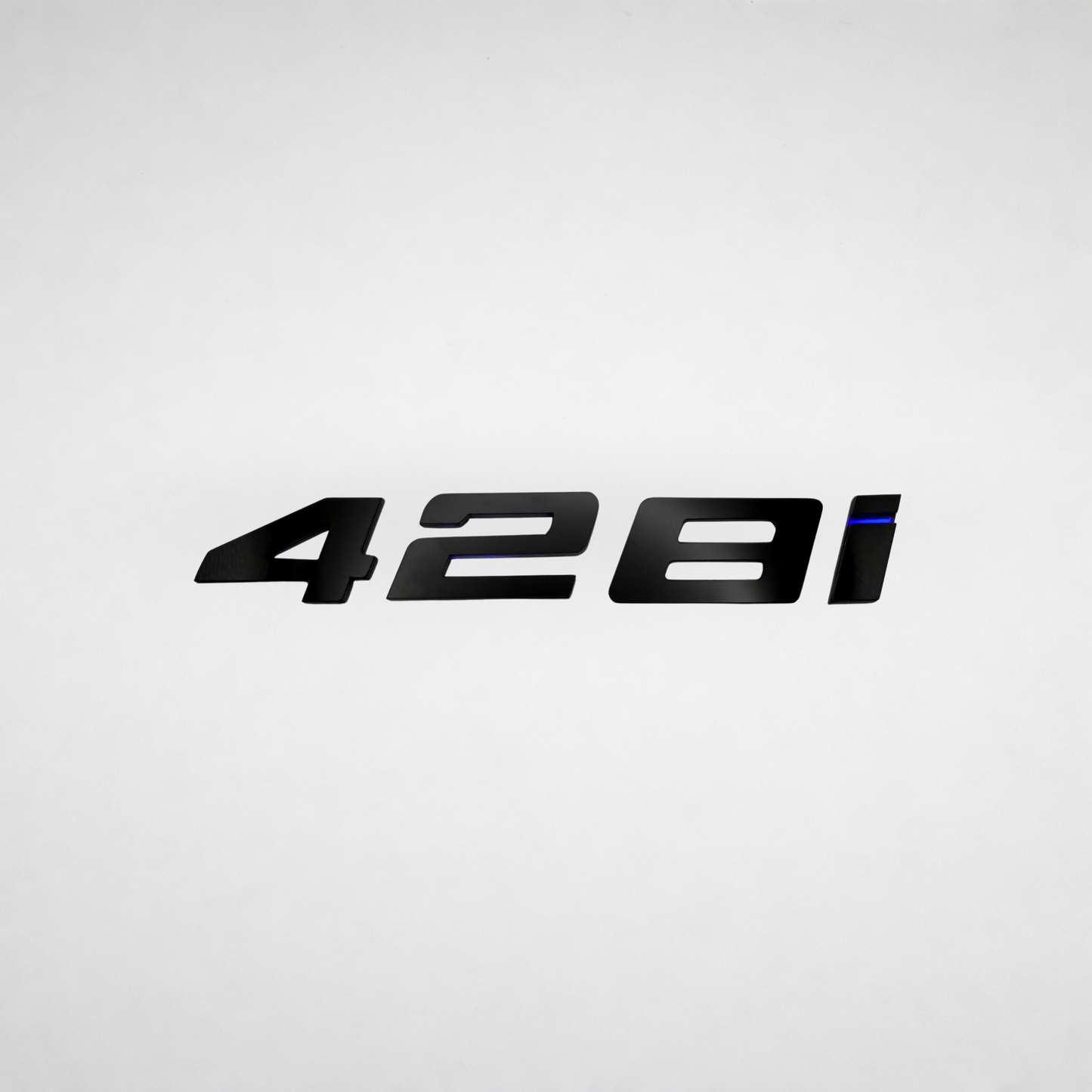 428i BMW Badge
