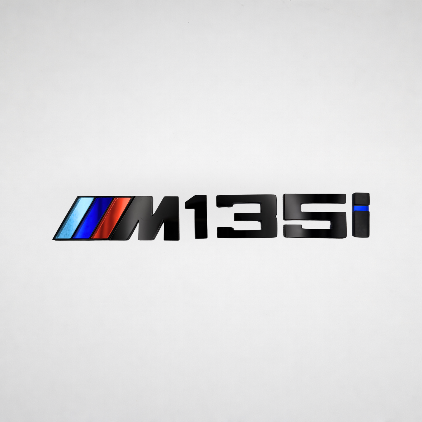 M135i BMW Badge
