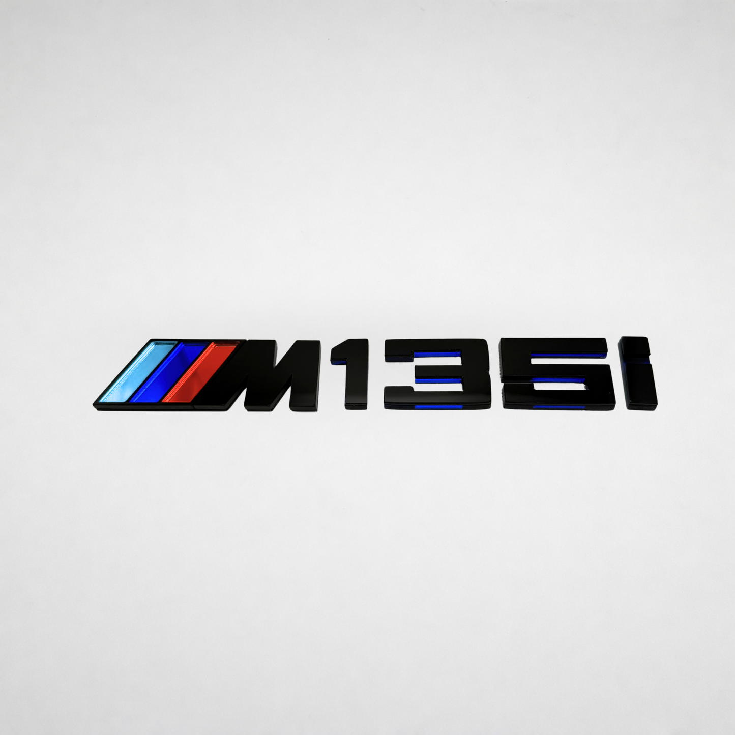M135i BMW Badge